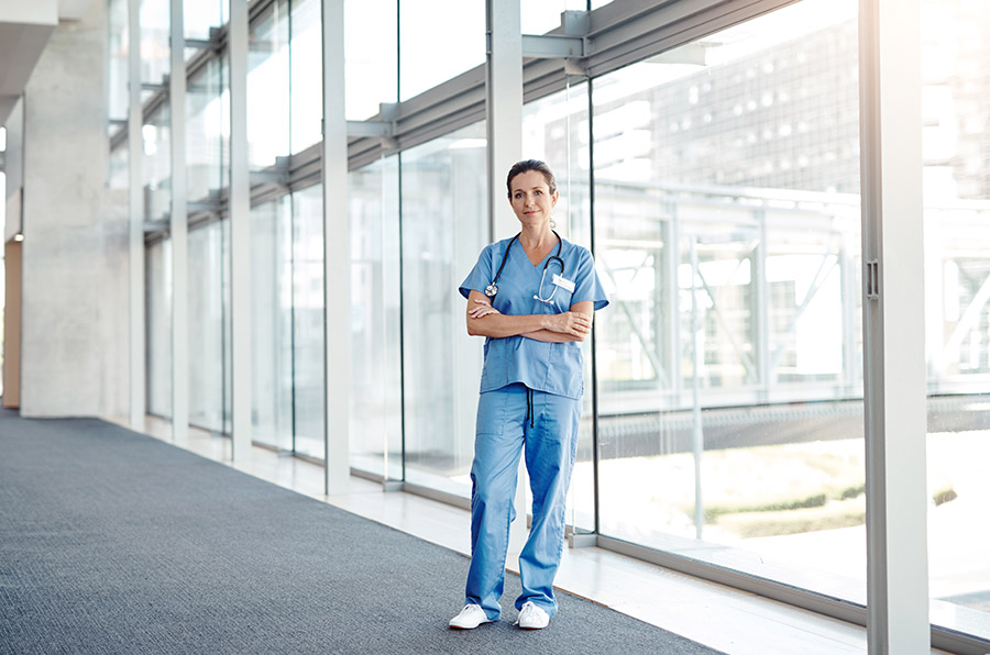 Shot of a female nurse standing confidently with her arms crossed